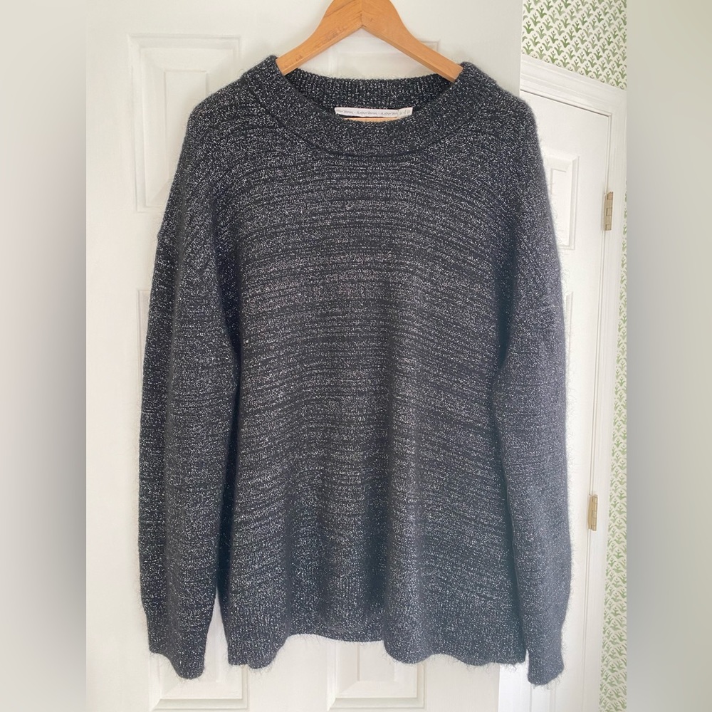 Fabulously festive black sweater with silver thread in excellent condition